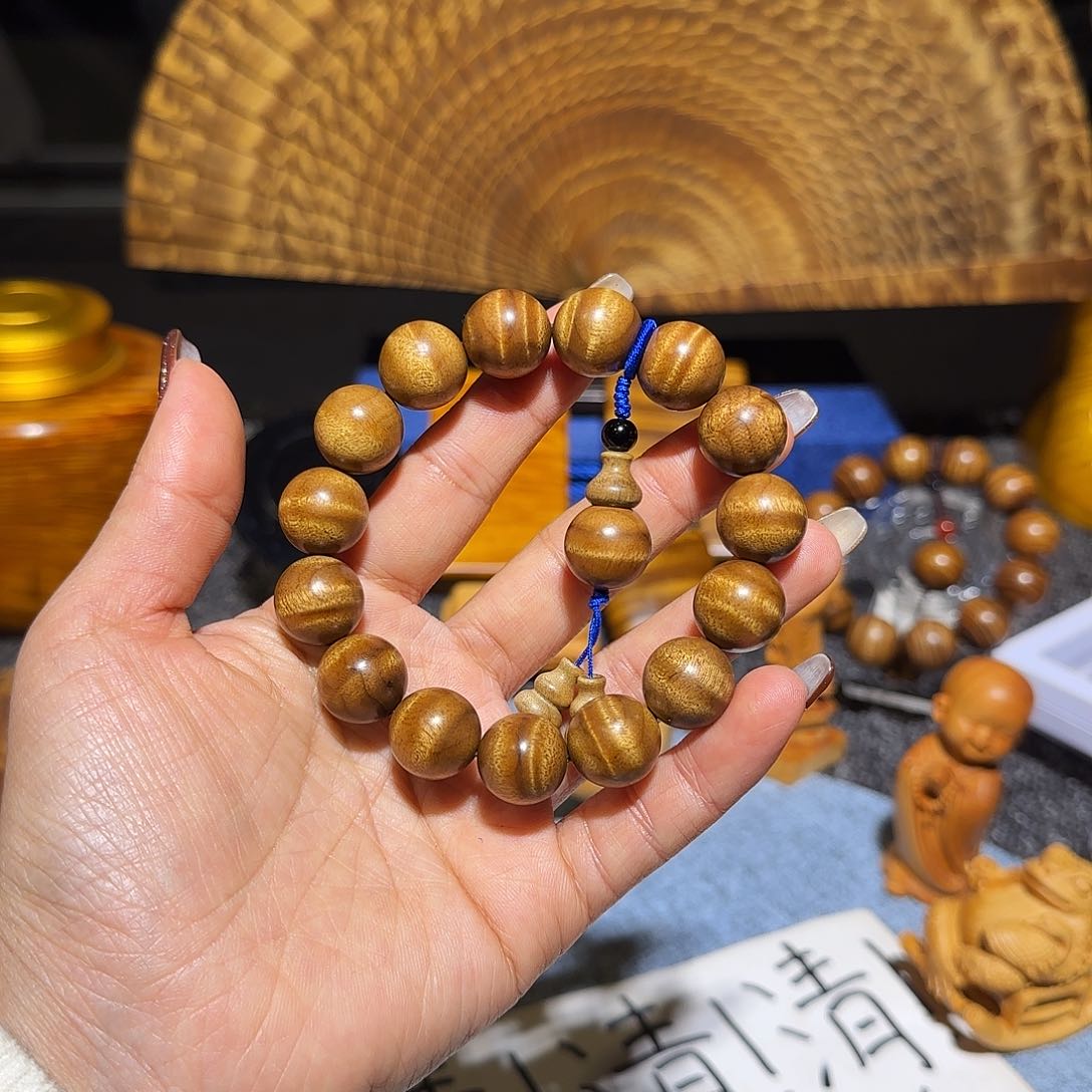 金丝楠超*金丝楠手把件