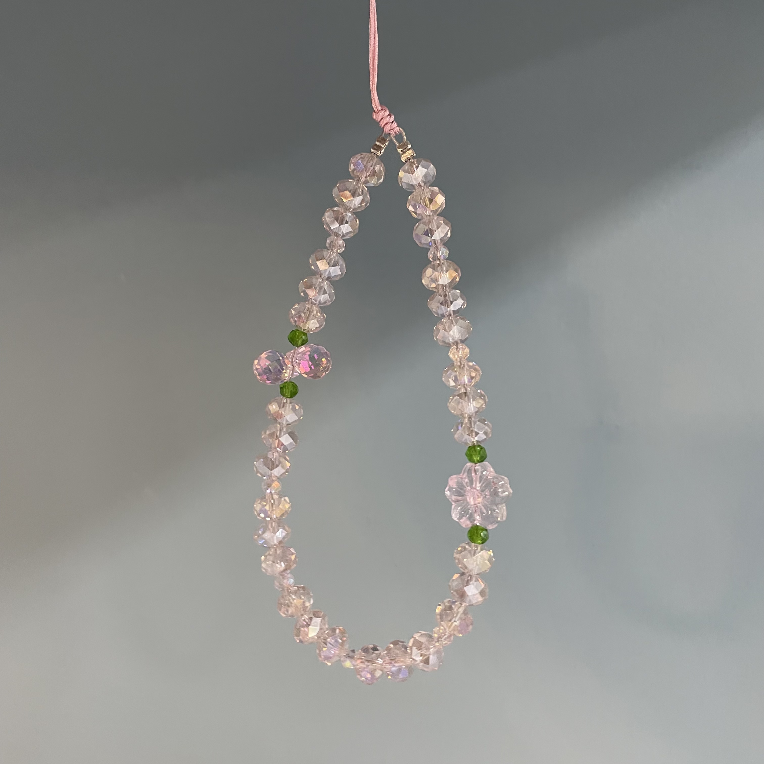 手腕绳款粉色手机链H430