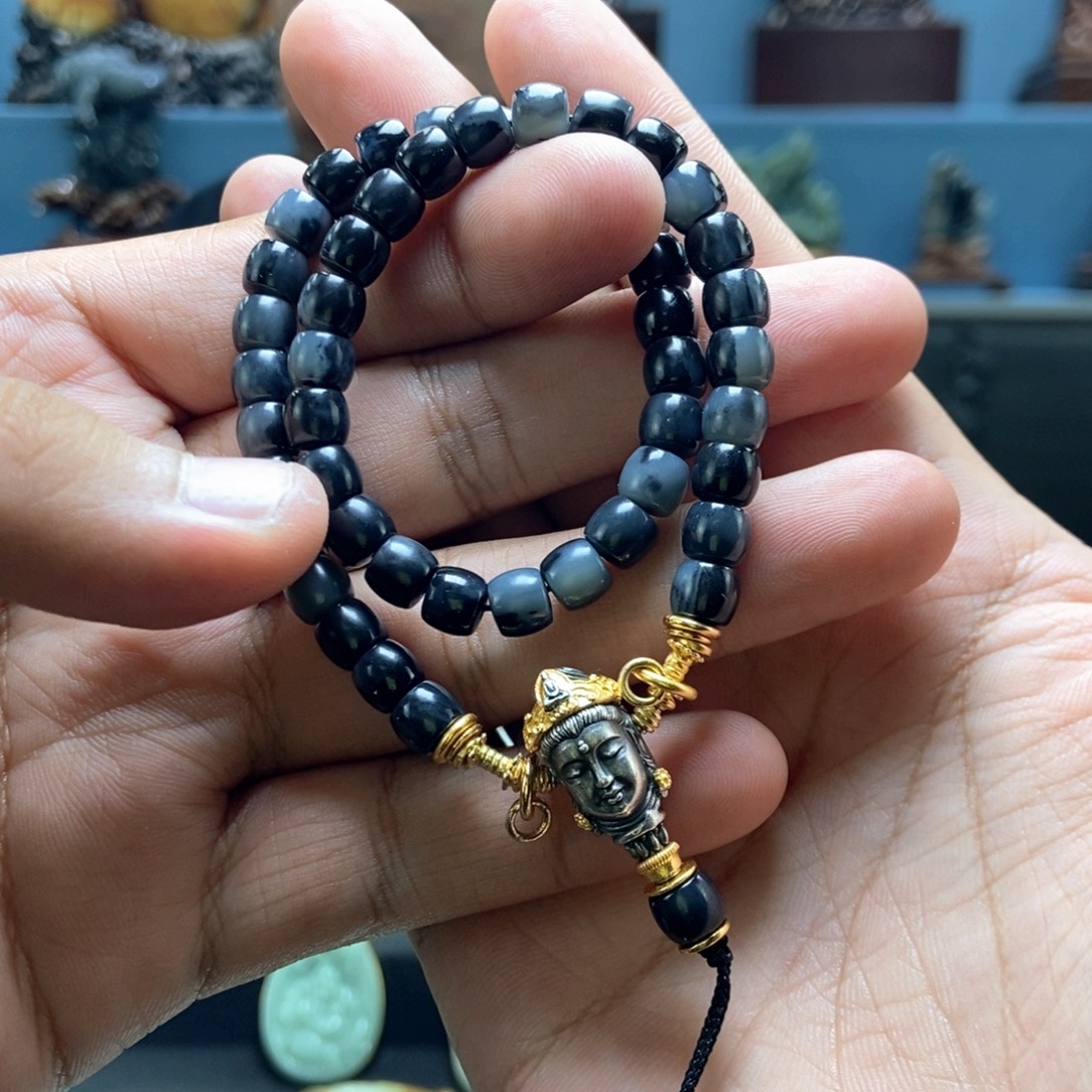 黄****和田玉未镶嵌把件