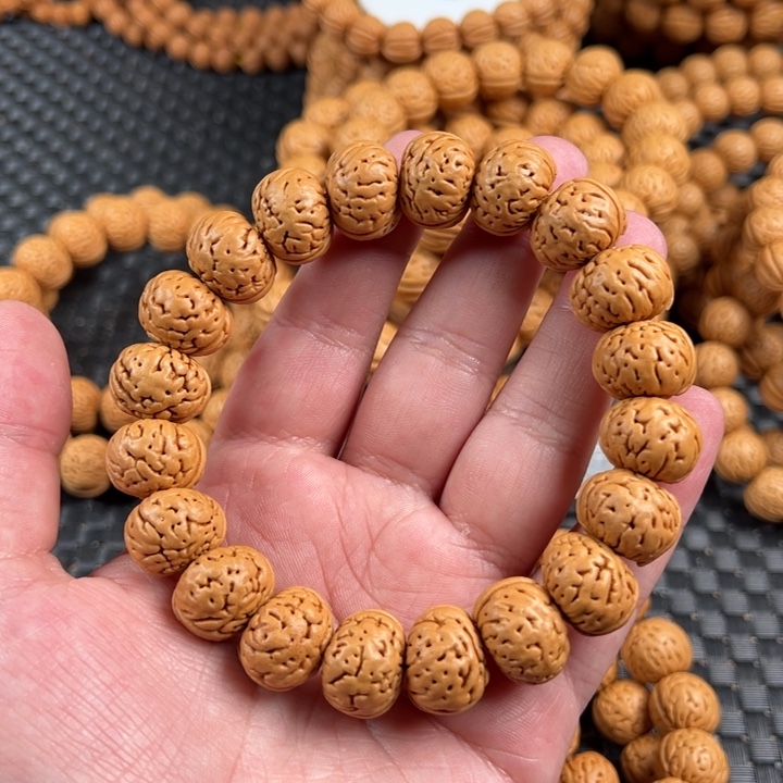 我***王手串桃核树王纽扣