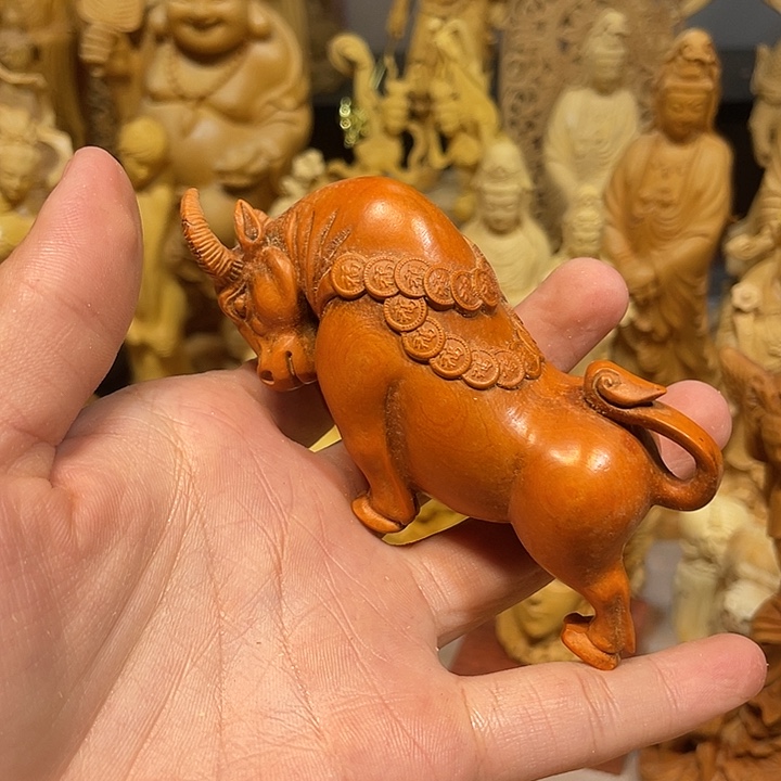 黄杨木小瑕疵铜钱牛