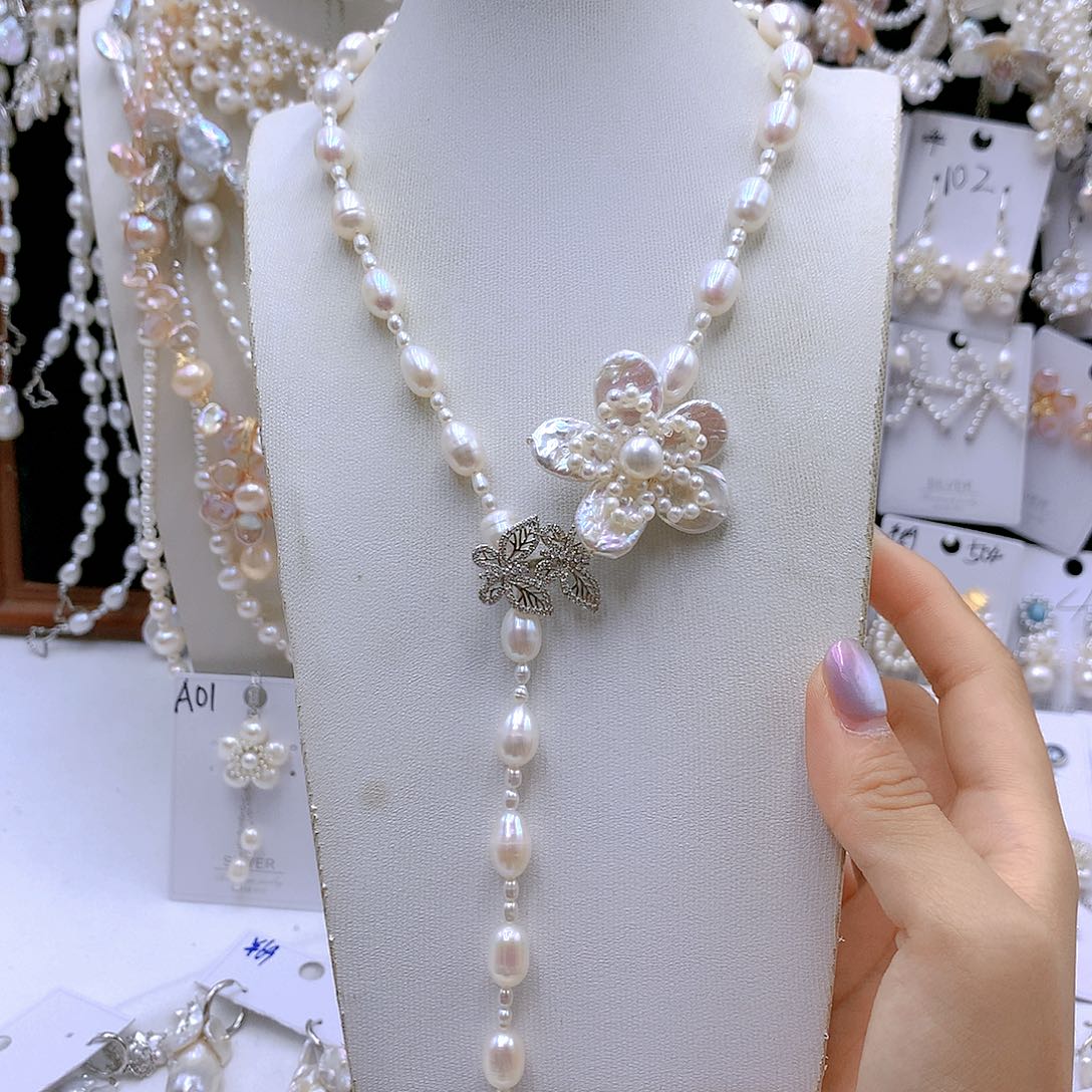 银S925镶嵌耳饰淡水珍珠人**花