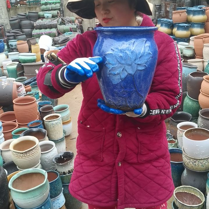 红陶口20高27瑕疵底部烧裂