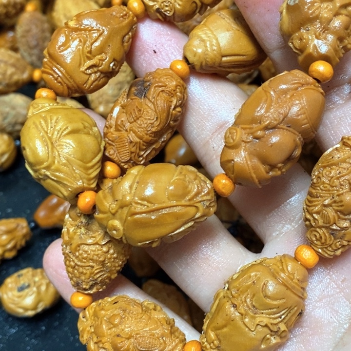 白***菜橄榄核手串/手链橄榄微瑕财神2串