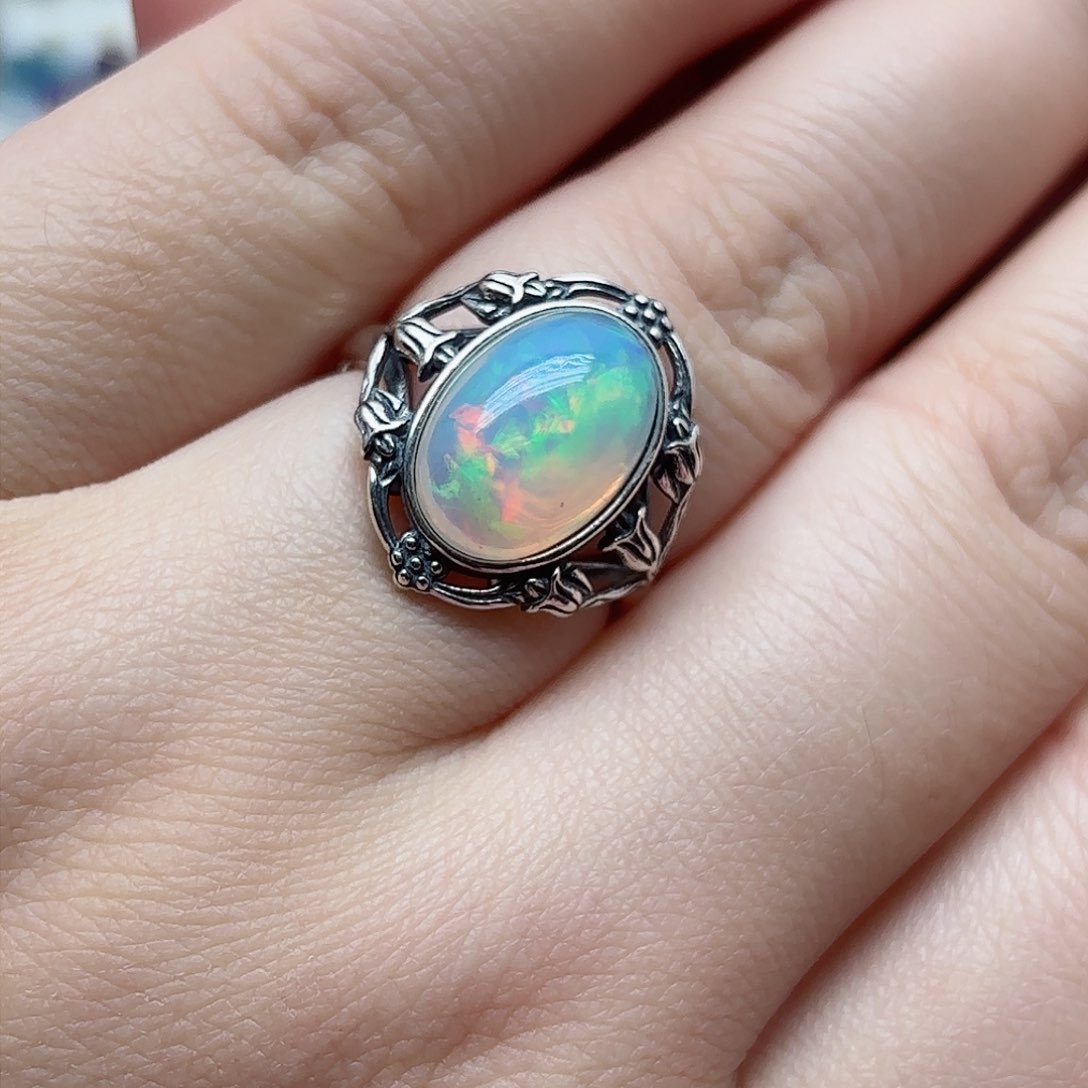 欧泊戒指银S925镶嵌R****a