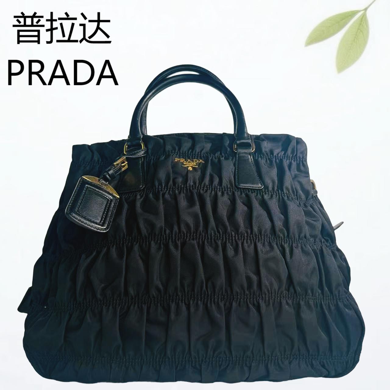95新 Prada/普拉达 黑金褶皱手提包G25310316底长33X27