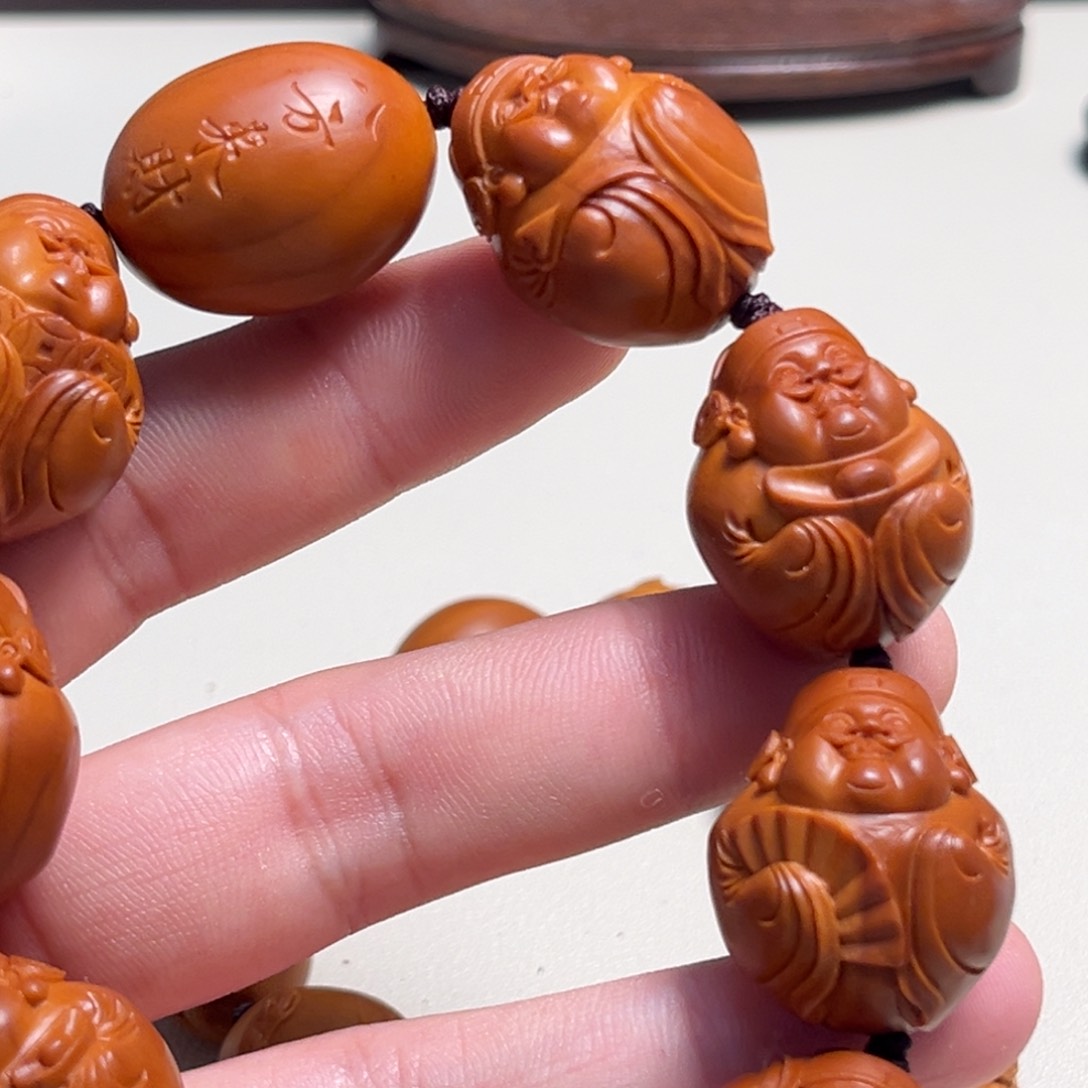 橄榄核吊坠呀*哈财神手串