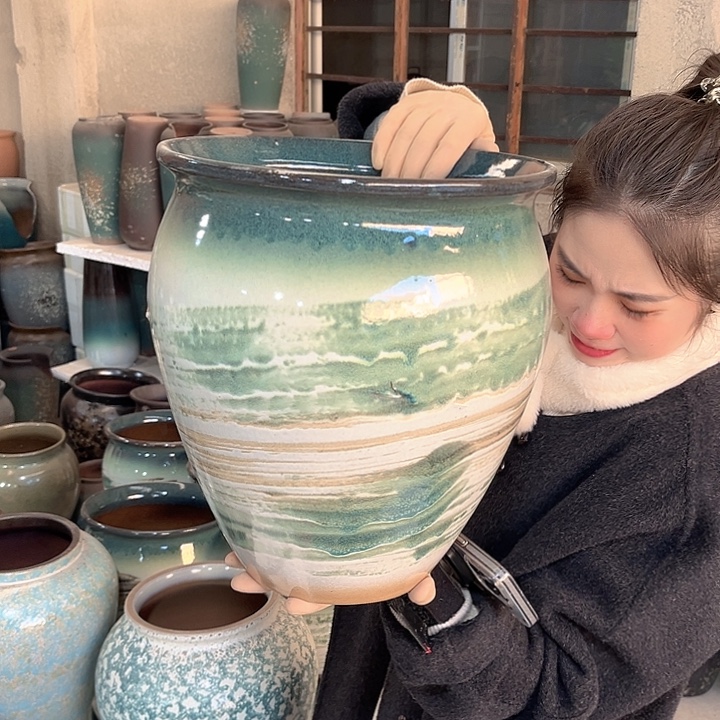 瑕疵口27高30花盆……