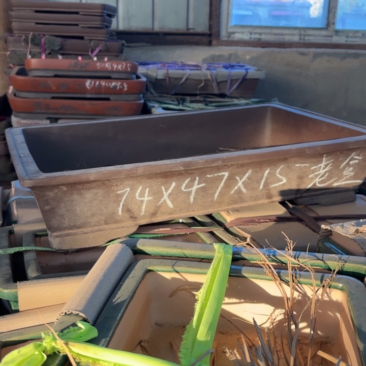 紫砂花盆200-1。    74