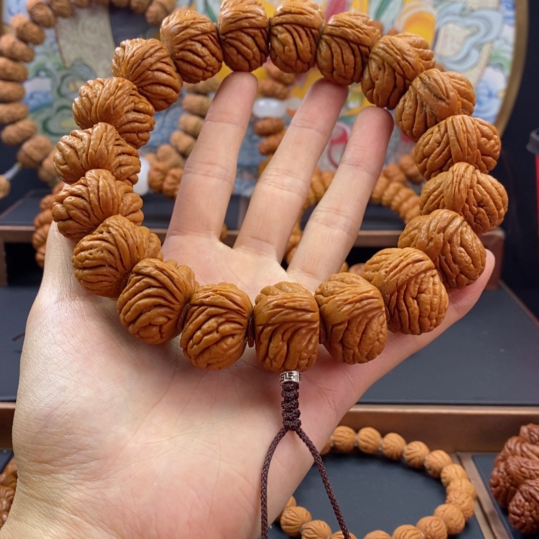 桃核手串龙纹桃核麒麟