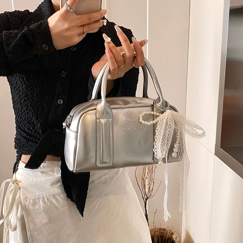 小众保龄球包2025春夏新款质感百搭手提斜挎包时尚简约软皮小包包