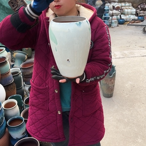 口15高27瑕疵盆子。