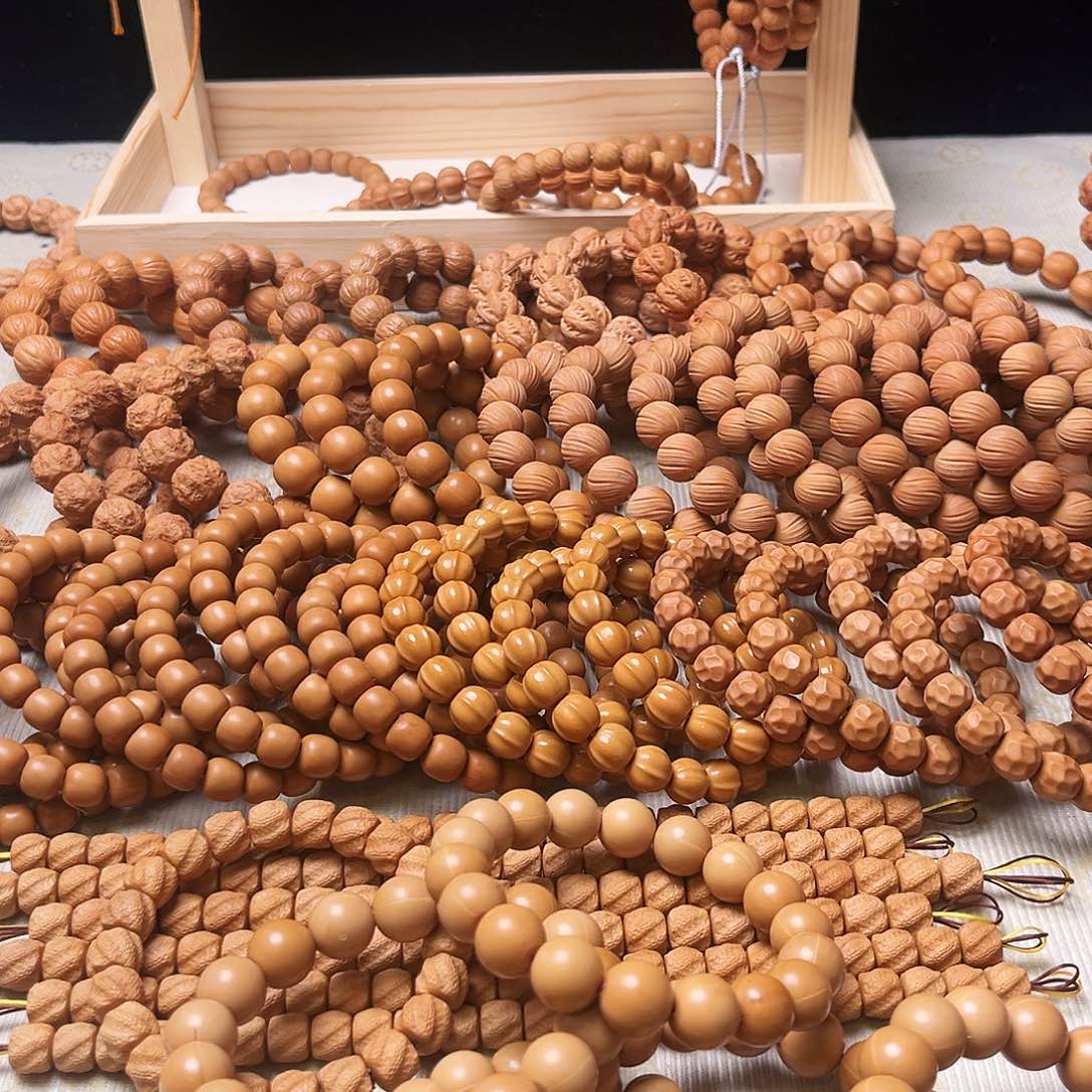 桃核手串瑕疵正圆光珠（漏眼）