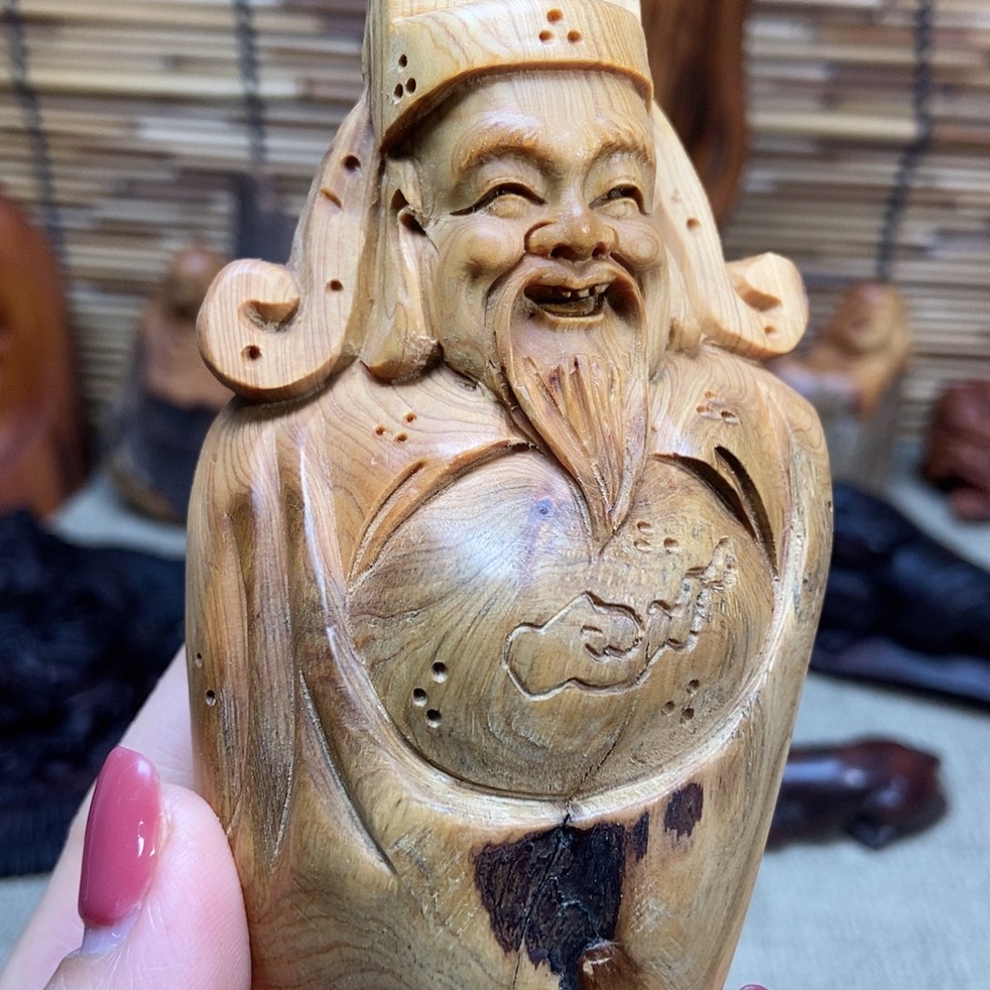 崖柏888888手把件