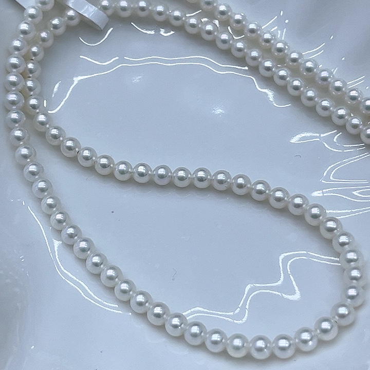 淡水珍珠颈饰18K金镶嵌鼻***?