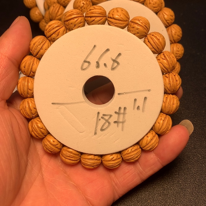 桃核手串18号健健康康了