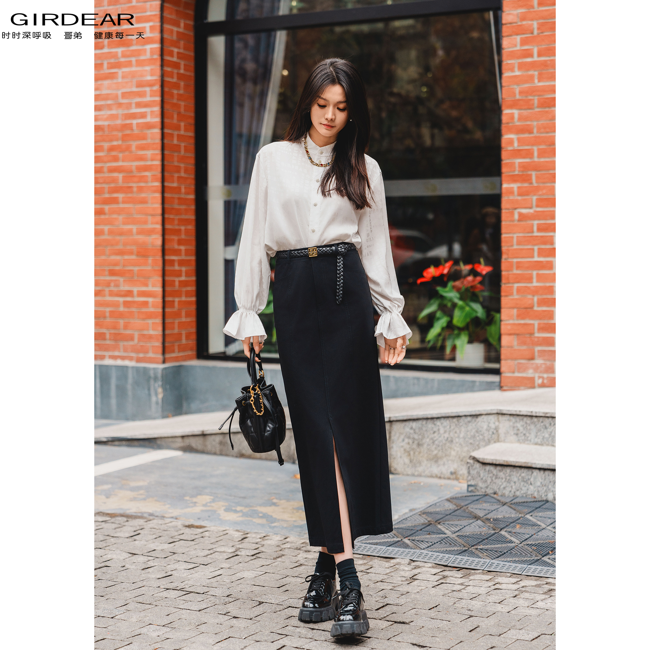 GIRDEAR/哥弟早春新款时尚简约轻职风开叉设计中长款半身裙120019