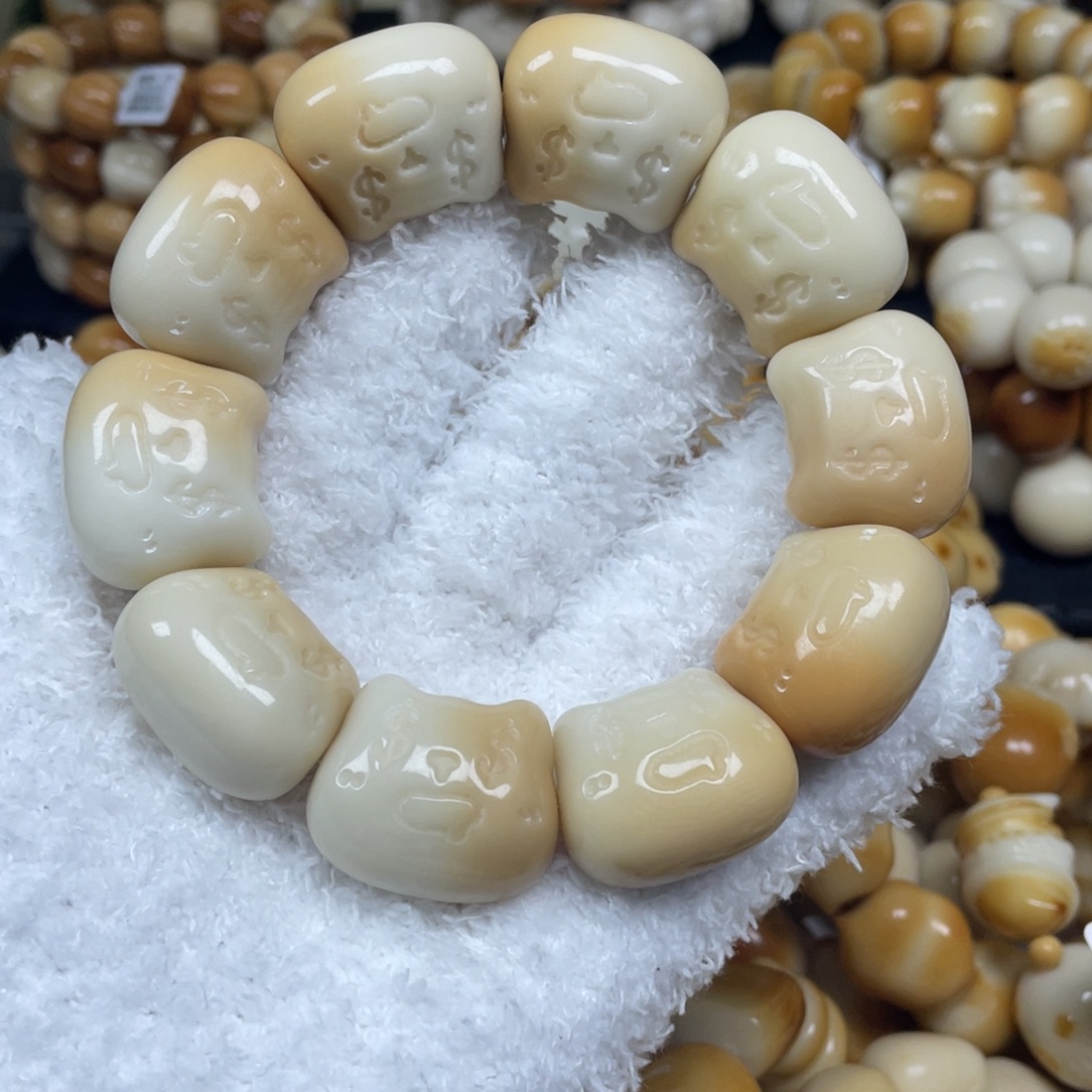 菩提根/象牙果手串12.24.7瑕美金猫