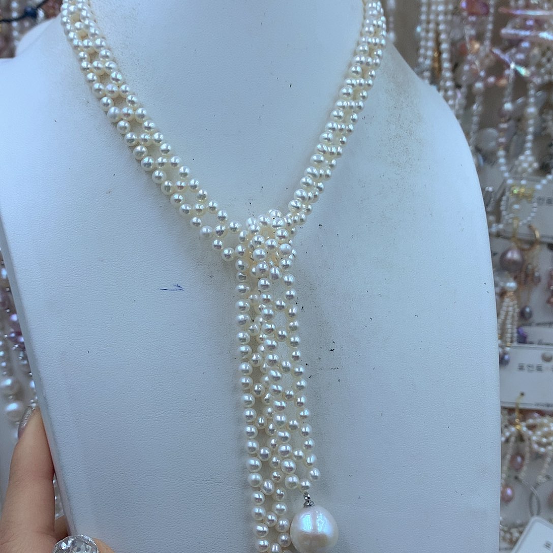 T***y淡水珍珠银S925镶嵌耳饰