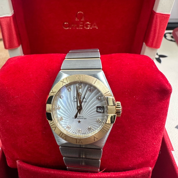 99新 Omega/欧米茄 机械/18k黄金/放射贝母盘/原钻/表径27mm