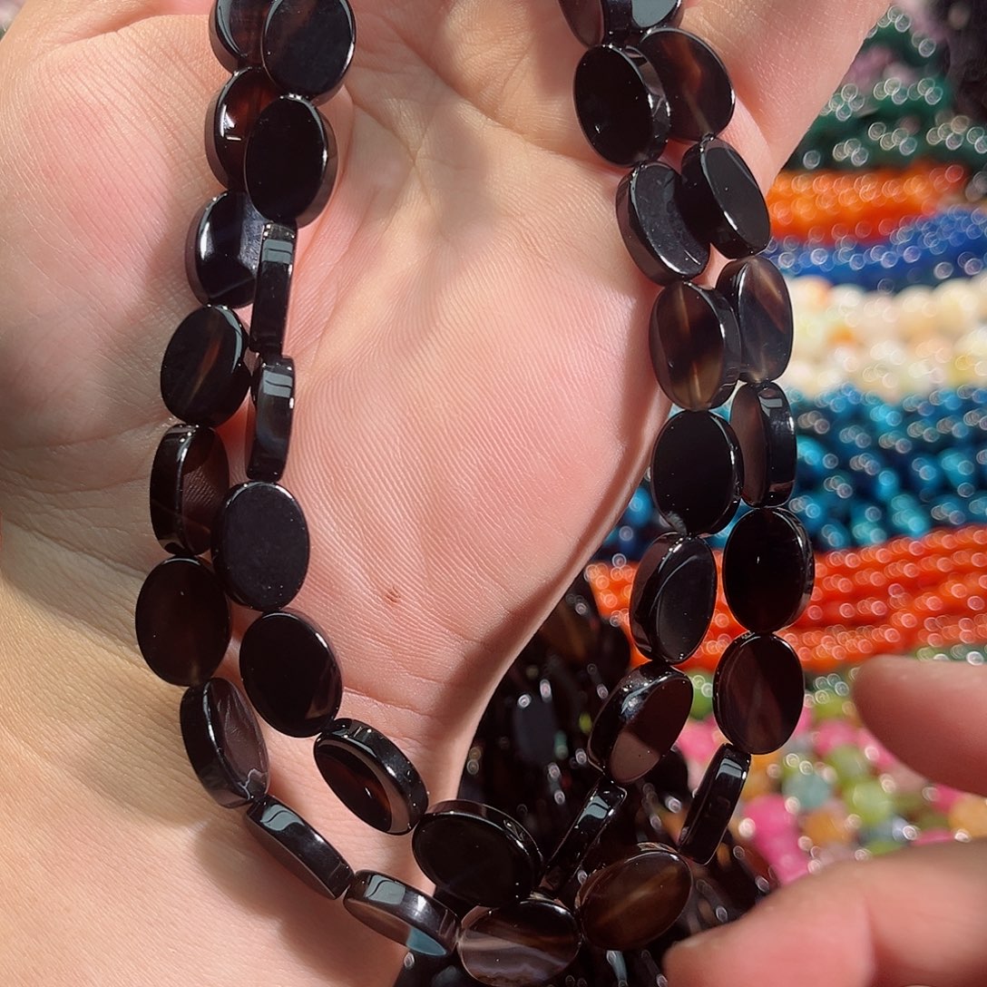 玛瑙/玉髓未镶嵌珠宝半成品黑玛瑙椭圆饼一条10x14mm