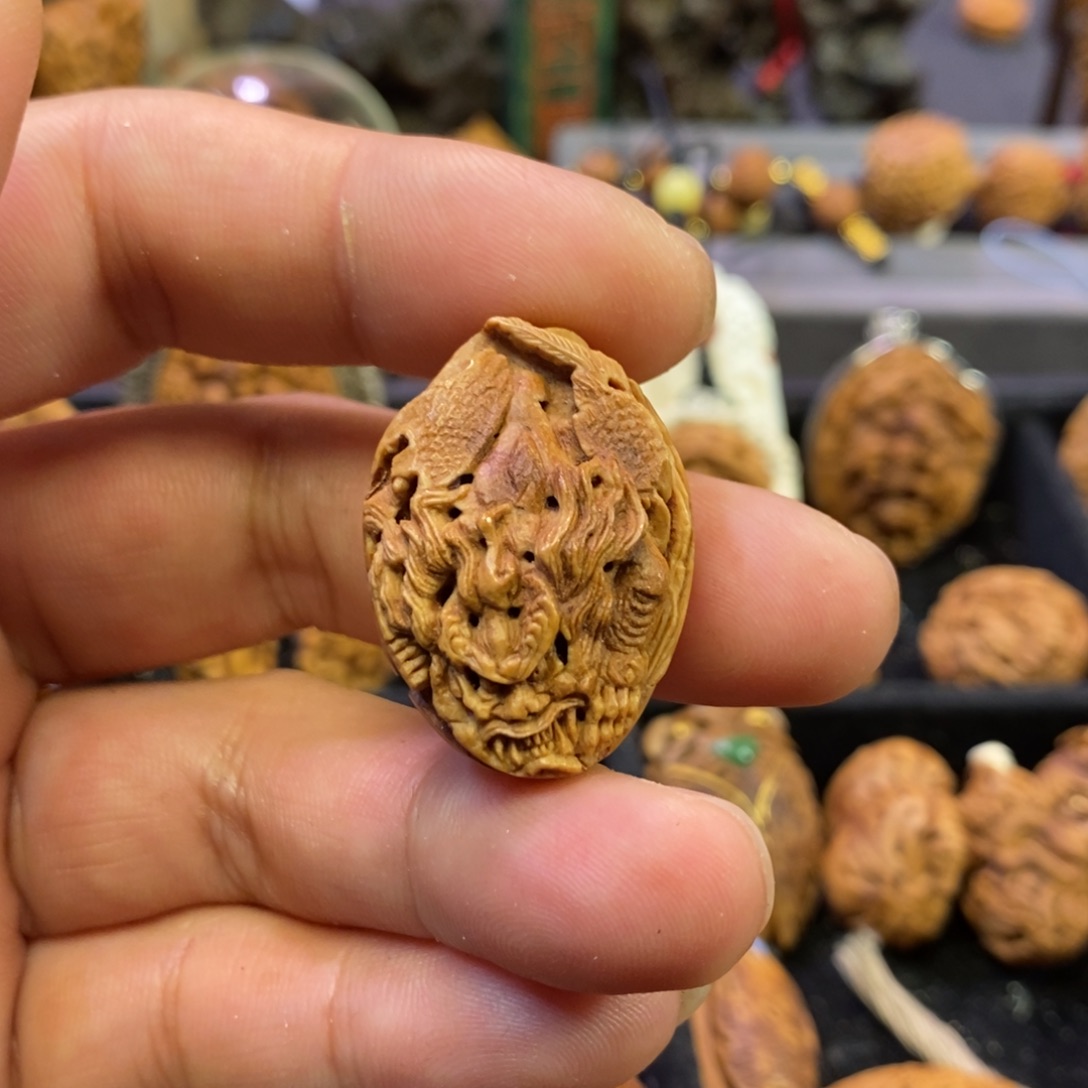 貔貅呐财潍坊核雕桃核雕刻