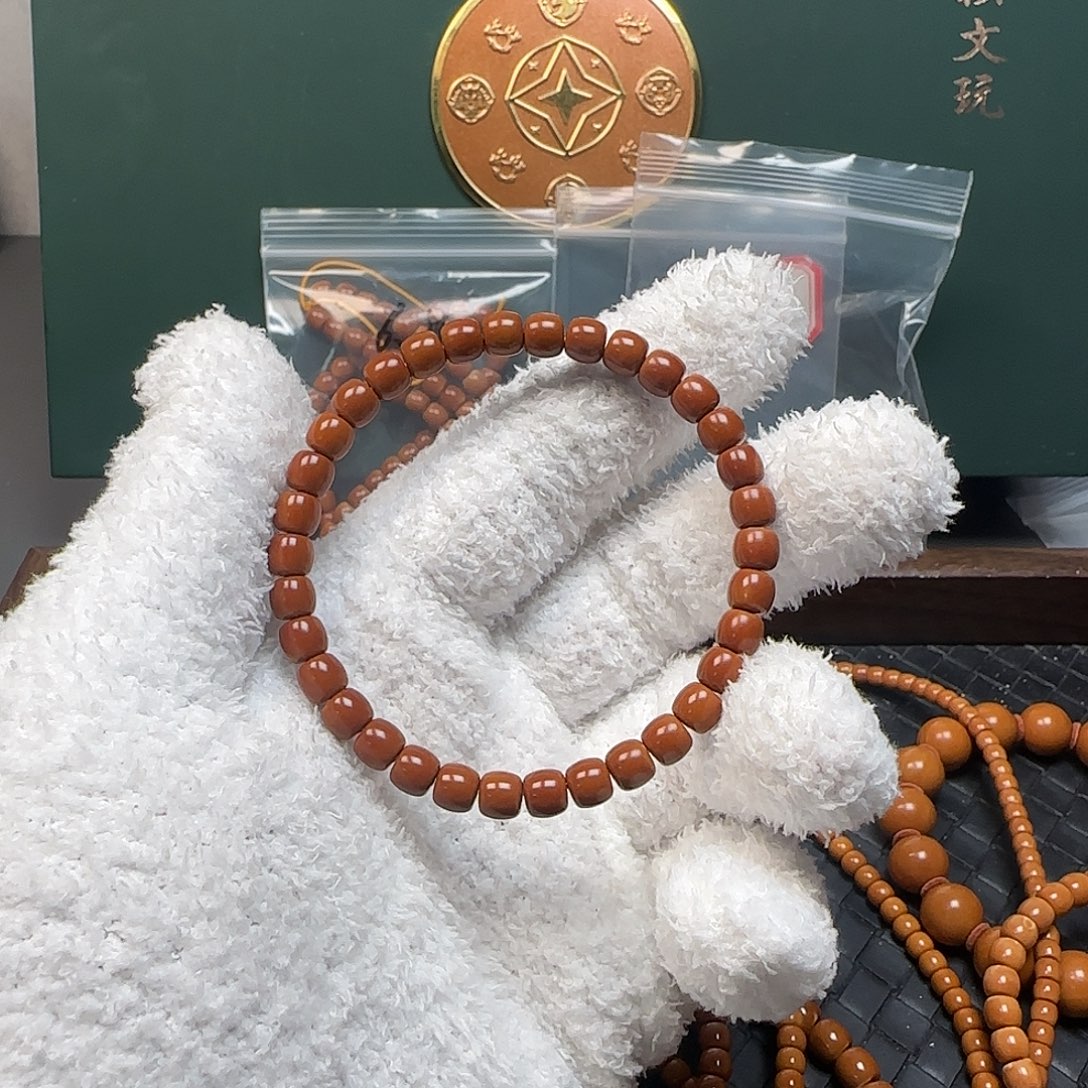 多***金橄榄核手串/手链6.5mm老挝核尖极限弧单圈