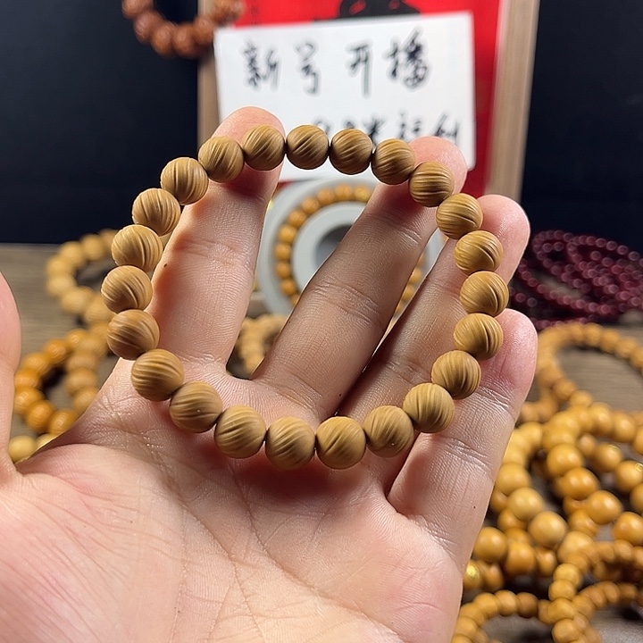 陈***默猴头核桃吊坠走色定风珠