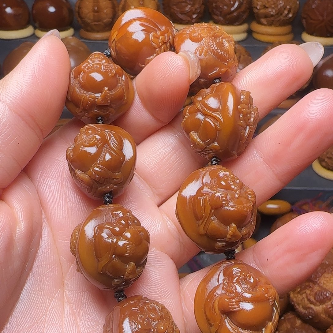 梦***，橄榄核手串/手链2.2龙财