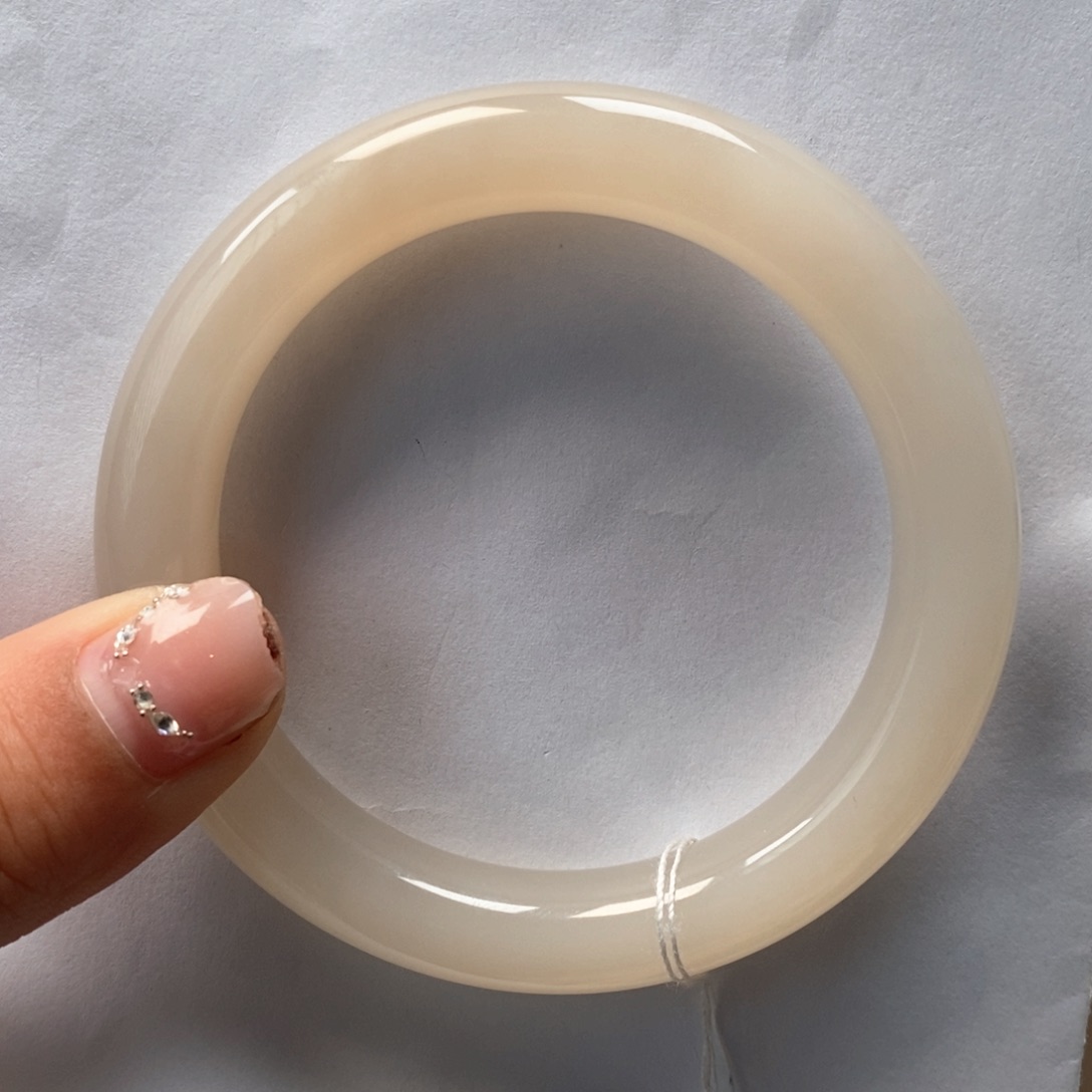 和田玉手镯未镶嵌藕粉泥鳅背55