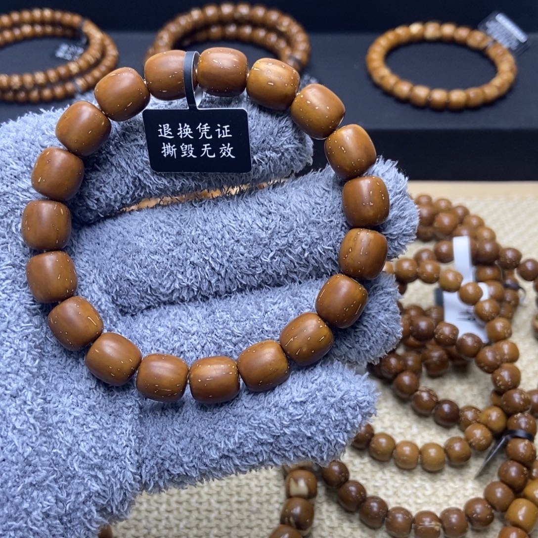 耀***g手串紫金鼠桶珠油核卡10.8