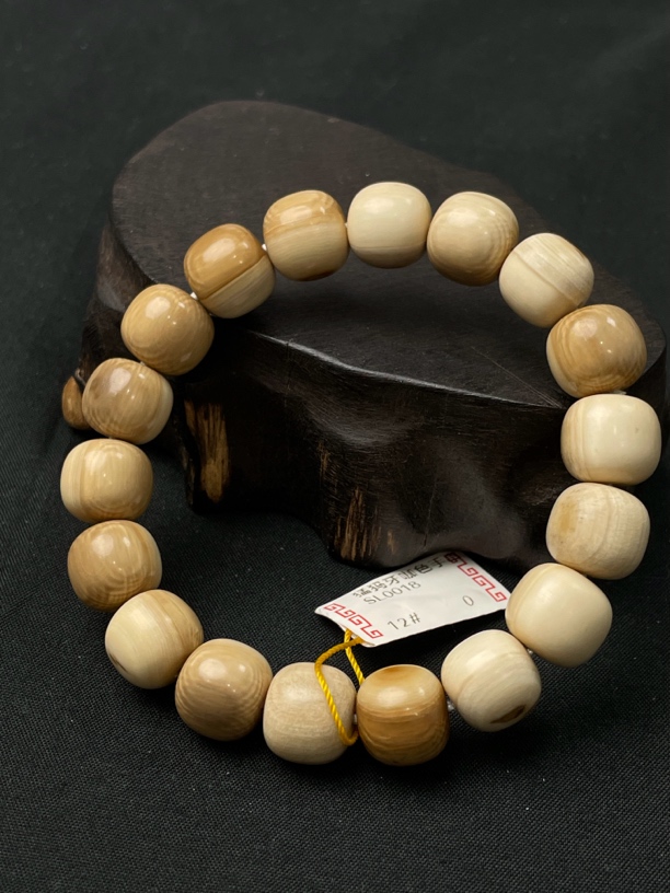 P03207 猛犸牙咖色老型珠子手串12*11mm