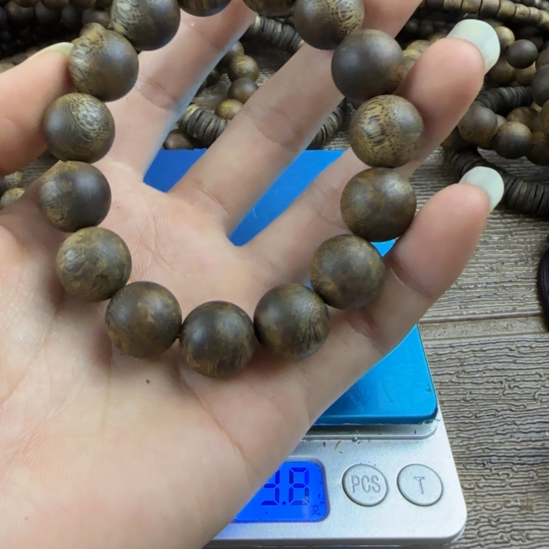 森***育沉香碎屑沉香➕1.5圆珠单圈