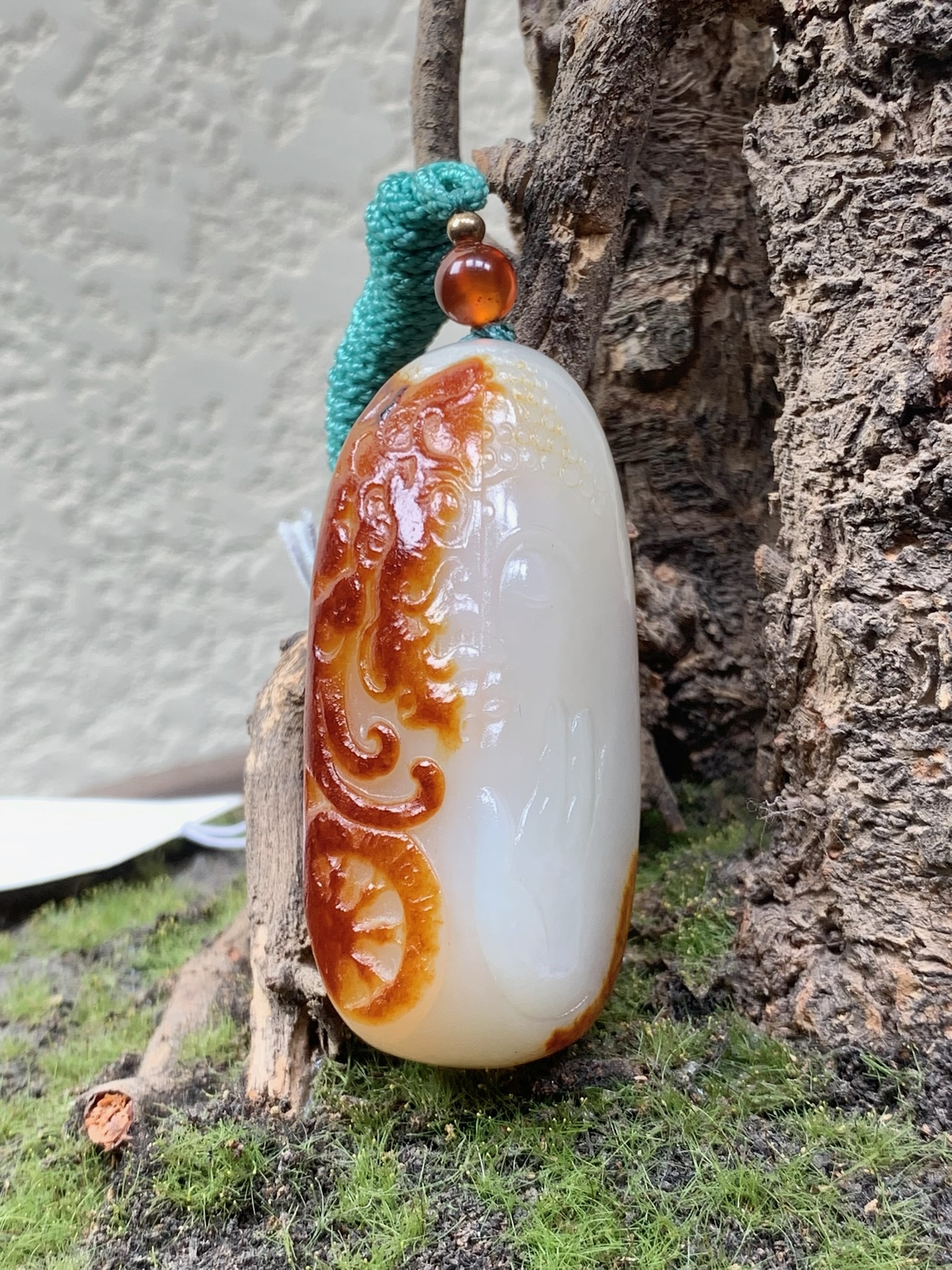 和田玉带红皮一念间吊坠，47克，52*25*22，货号02136，8310074