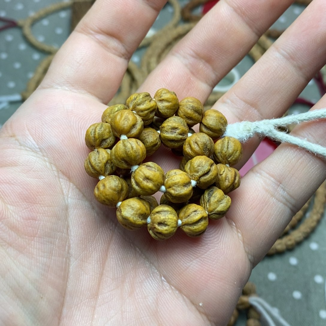 柏香籽/百香籽吊坠红芽口三棱莲花桩原桩手持9左右