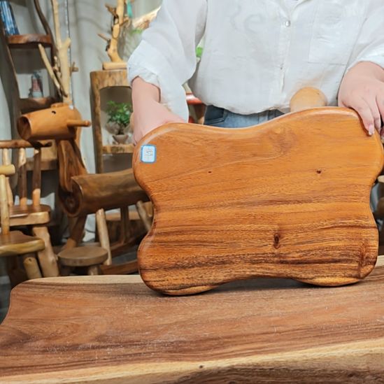 聚***竣木（非红木类）异形凳微瑕