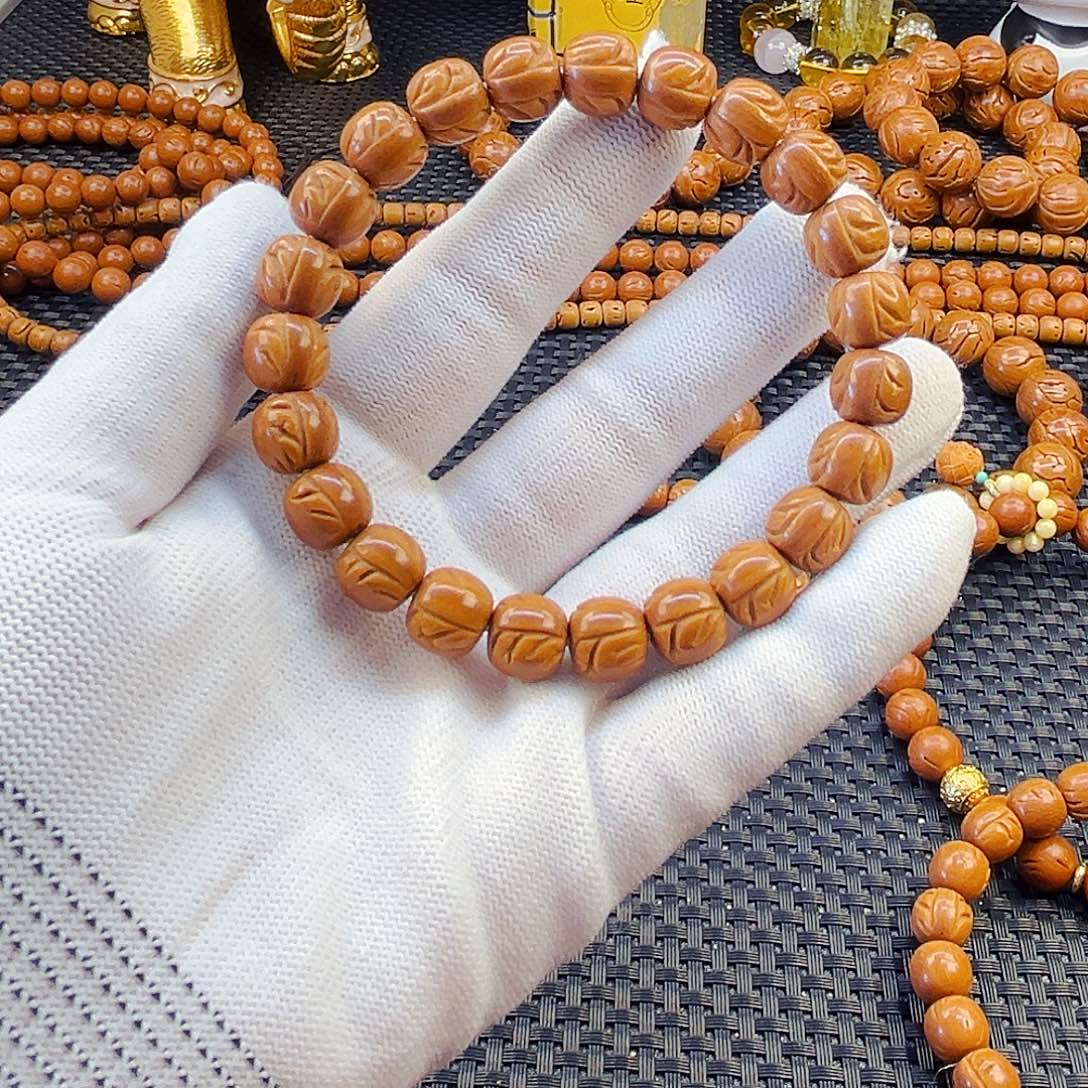 金***授桃核手串野生龙纹老型单圈9.3