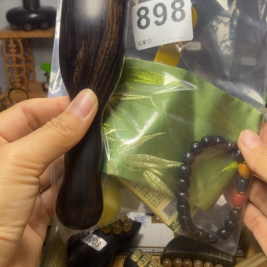小***爱紫光檀56齿羊角按摩