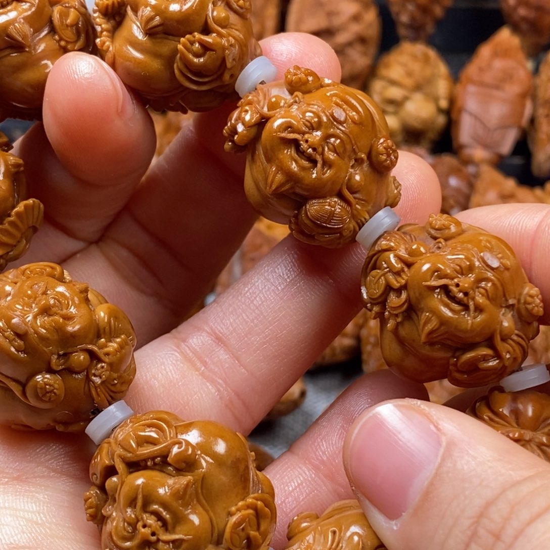 橄榄核手串/手链2.4黄玲 八大横财神手串 大发横财