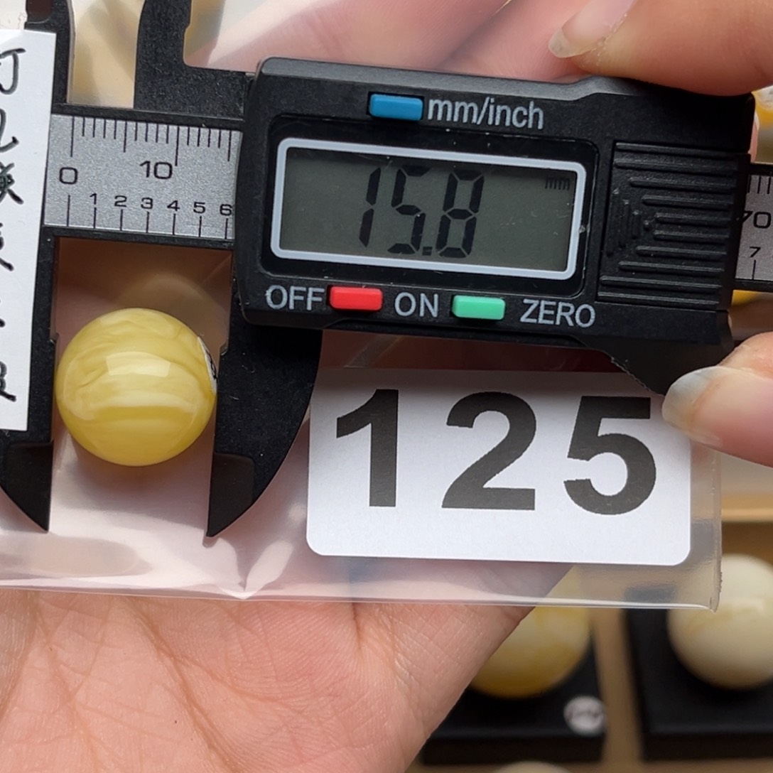 蜜蜡裸石未镶嵌不****?蜜蜡