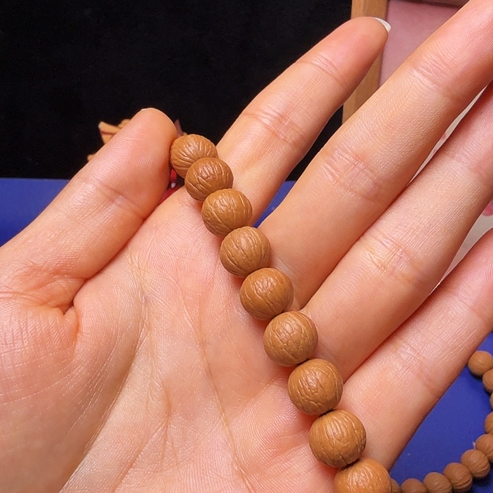 随****吊坠猴头核桃凤羽