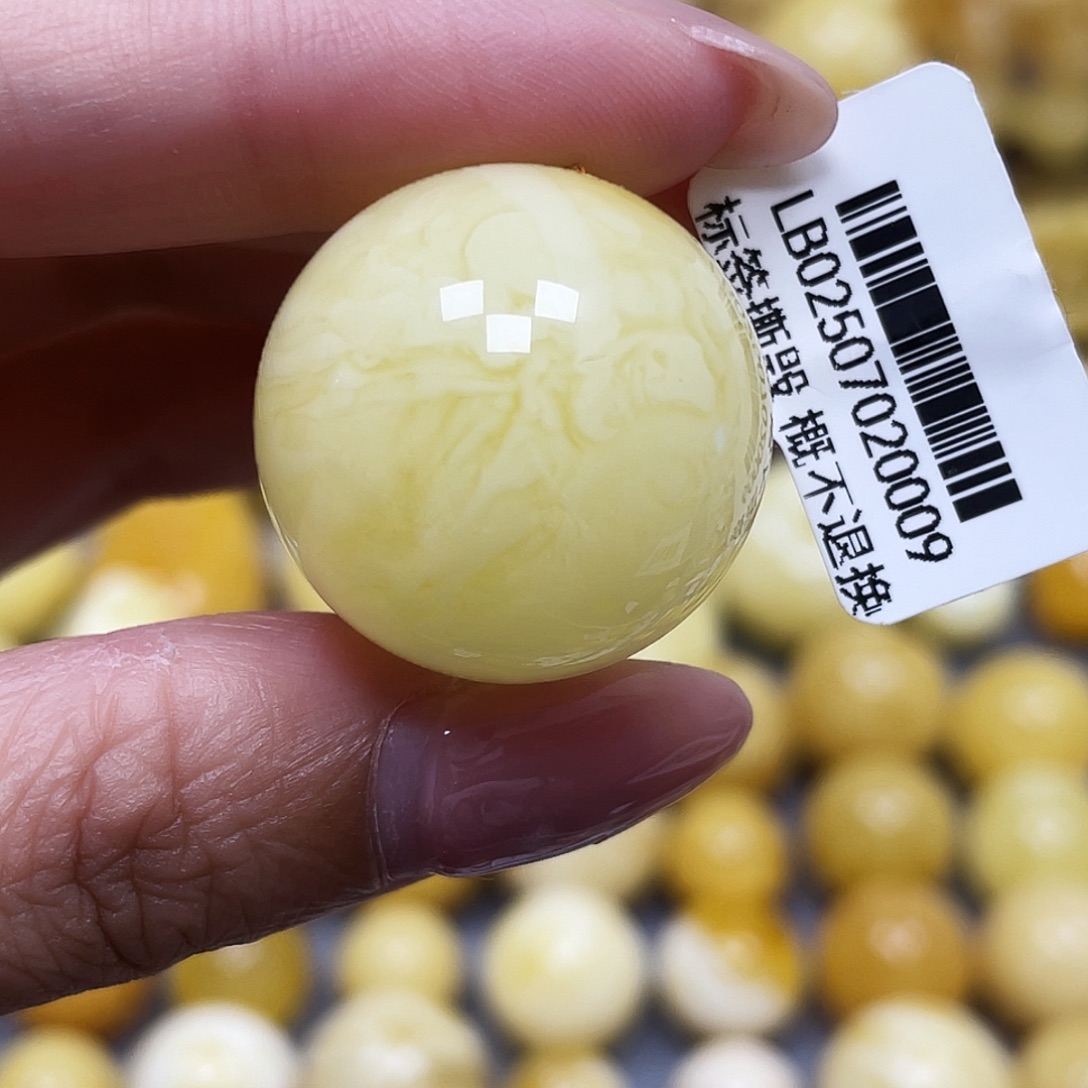 蜜蜡未镶嵌裸石24.7mm瑕