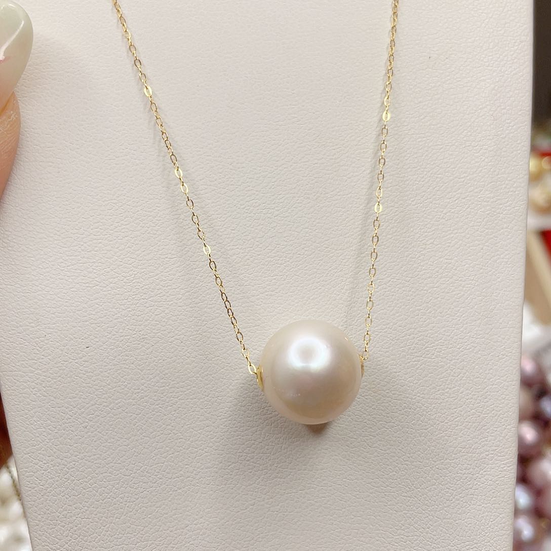 妞***妞淡水珍珠18K金镶嵌吊坠(赠链)