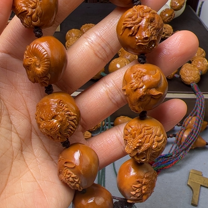 用***儿吊坠橄榄核橄榄核