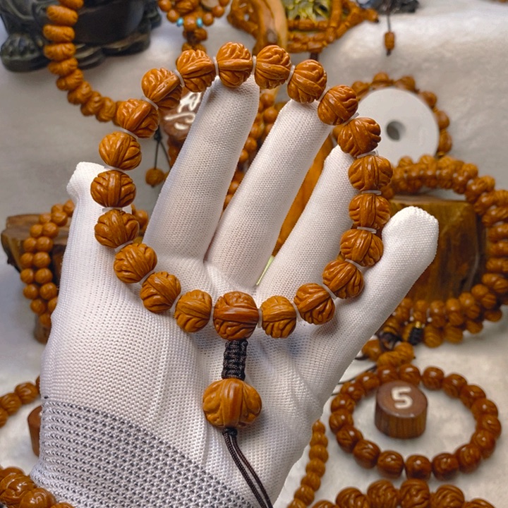 桃核吊坠小****）聚宝盆手持