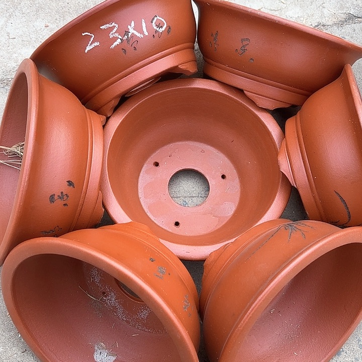 紫砂花盆100-7。  23-10