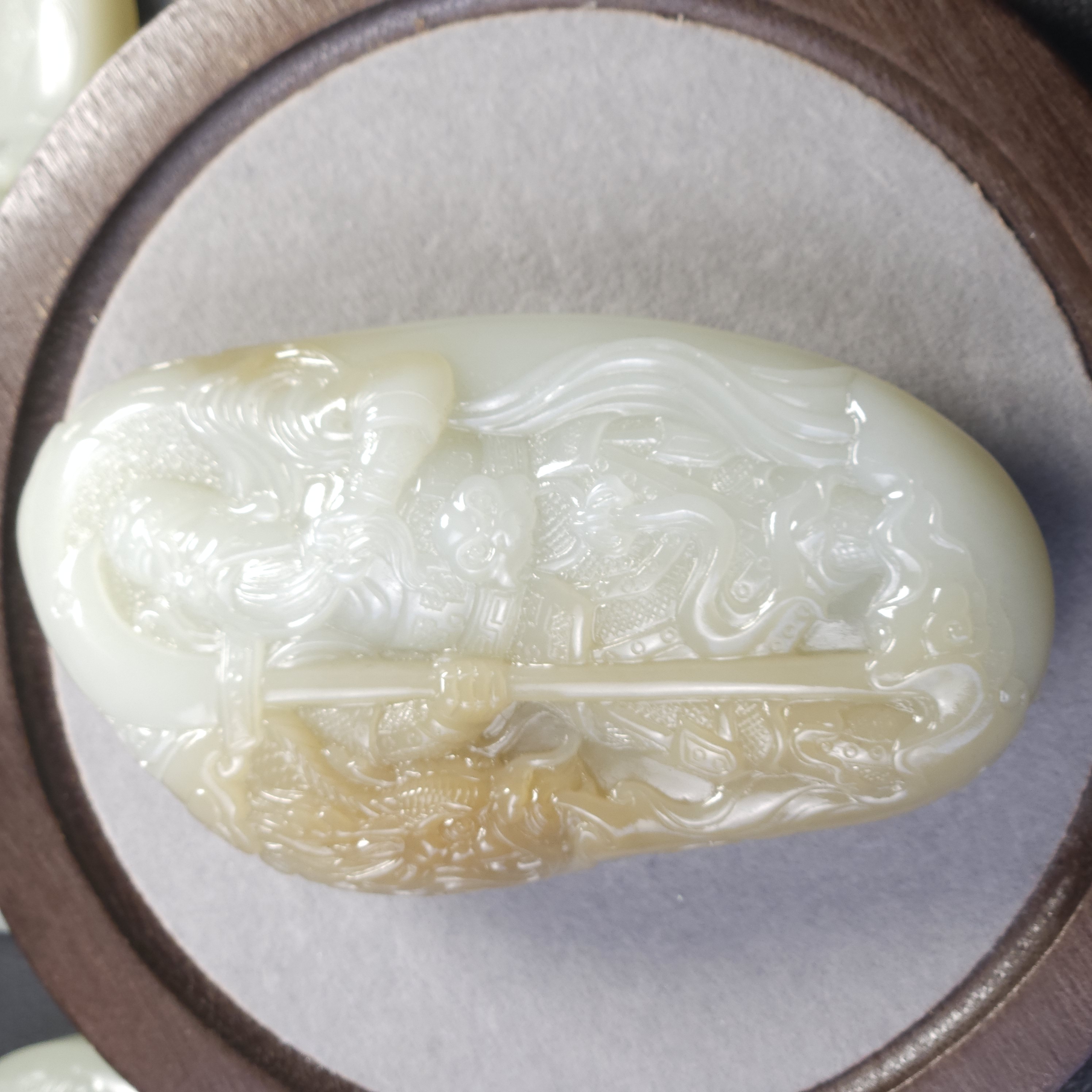 新疆和田玉且末料糖白关公手把件俏色精雕