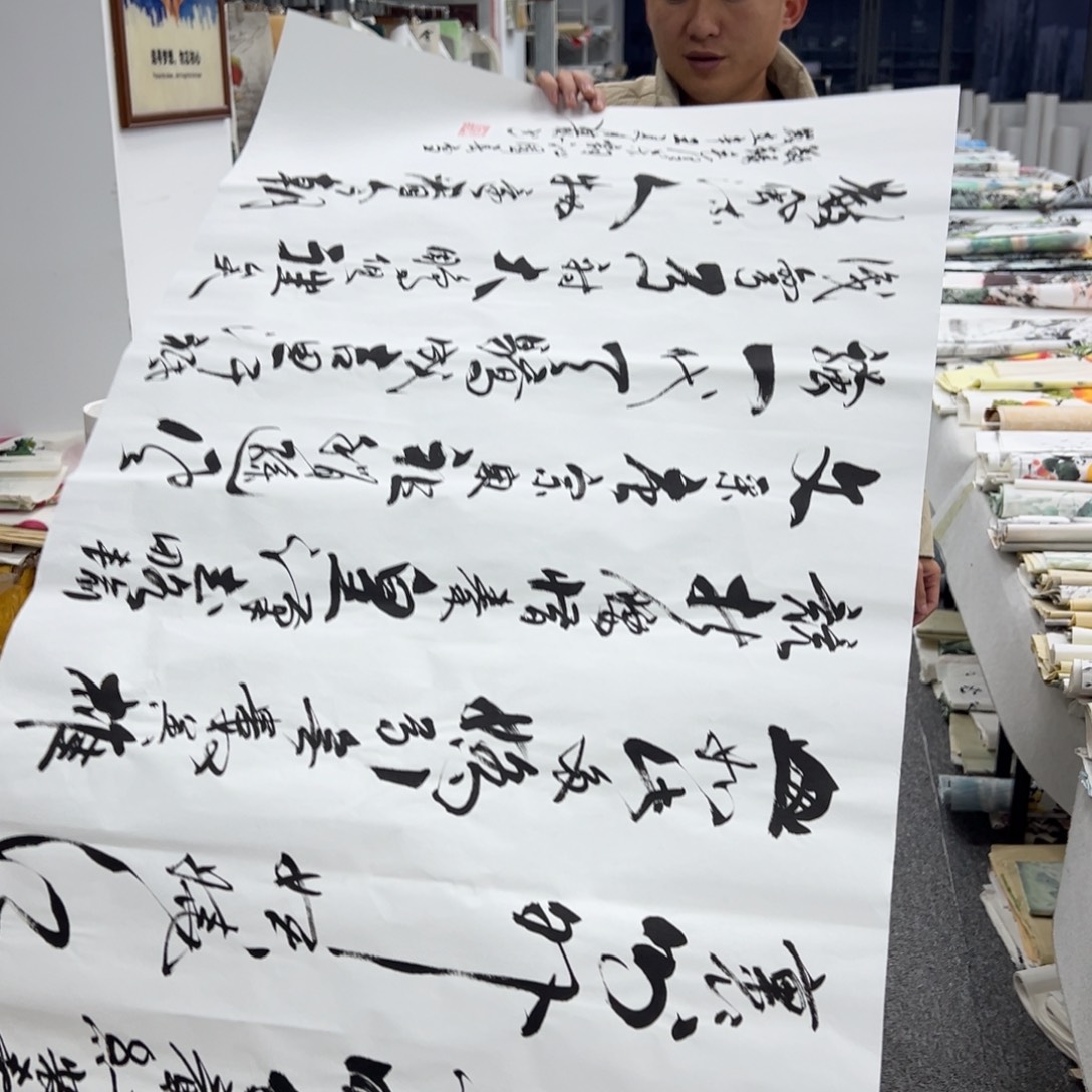 国画卖字画的小男孩