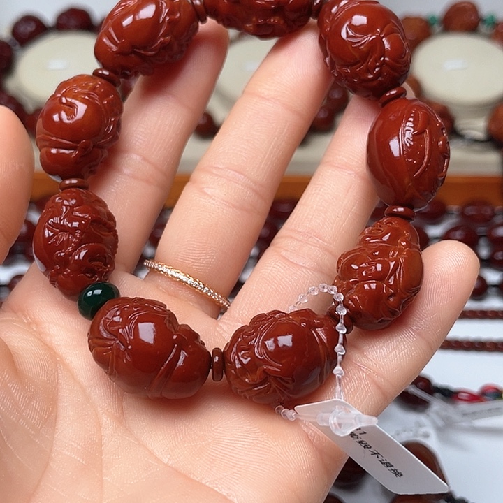 橄榄核手串陈*生包浆玉化