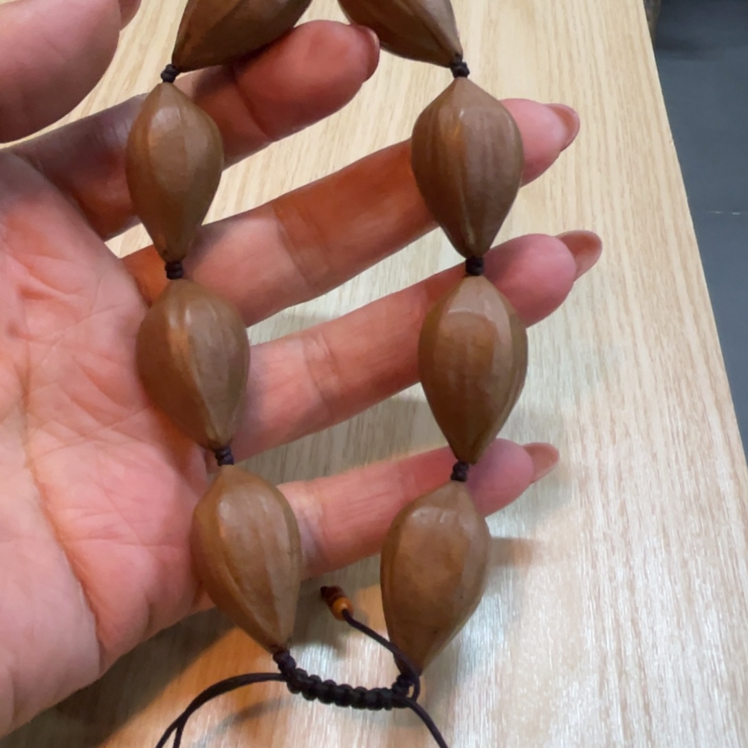 橄榄核吊坠四花原皮素串